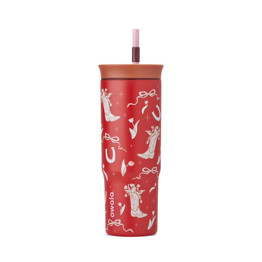 Birthday Bash Marlu Giddy Up 24oz Tumbler in deep red with cream illustrated cowboy boots, horseshoes, ribbons, and stars, terracotta lid, and pink straw