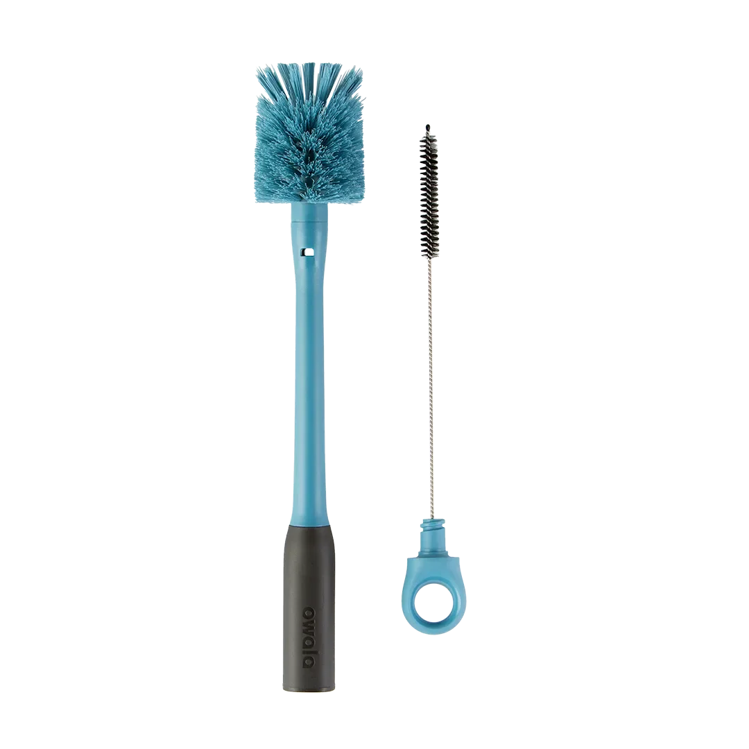 2-in-1 Bottle Brush in teal blue, large bristle brush with teal handle and dark gray grip beside small straw cleaner with teal ring handle